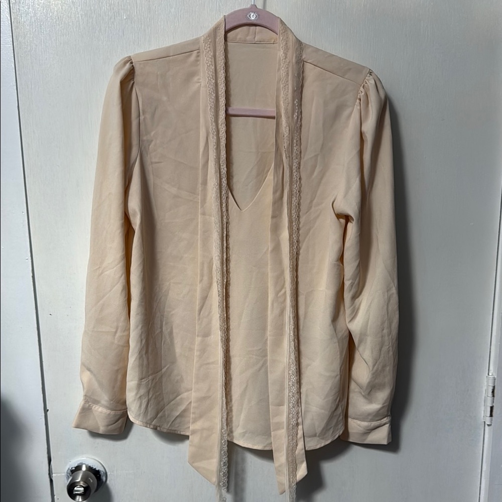 Elegant Cream Blouse with Tie Detail